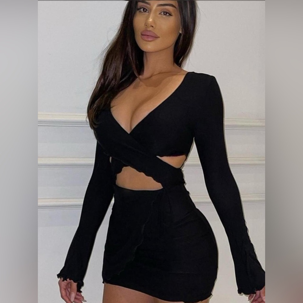 Tiger Mist Black Sunnie wrap cut dress with bell sleeves.